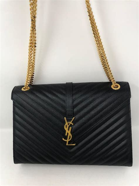 ysl black and gold bag.